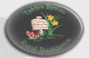 Tyddyn Bychan Logo Tyddyn Bychan bunk barn mountain bike wales.