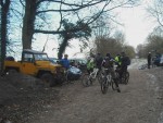 Riders in gravel car park.