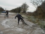 Rider sinks in ice.