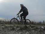 Silhouette of Rider on hill.