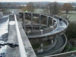 Spiral footbridge over motorway.