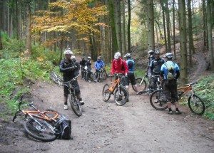 Riders milling about on a track.