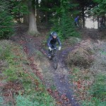 Riding down a ramp in the Forest of Dean.