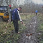 Dropping a brick into the muddy path.