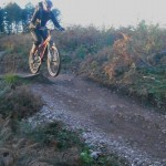 Getting air on the final section of Follow the Dog trail at Cannock Chase.