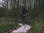 Women riding mountain bike.