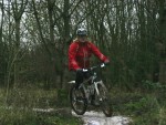 Women riding bike at Croft Trails.