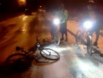 Mountain bike riders on icy road.