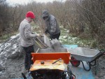 Filling muck truck.