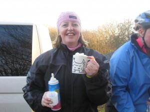 Woman with mug of hot chocolate.