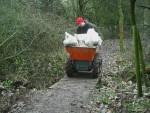 Power barrow on bridge.