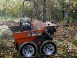 Belle Group dumper with flat tyre.