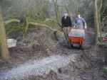 Power barrow being used to build a bike trail.