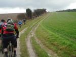 Mountain bike riders on hill.