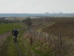 Mountain bike rider on hill near Didcot power station.