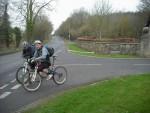 Two riders on road towards Barbury castle.