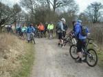 Group of riders stopped on ridgeway.