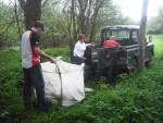 Unloading bricks from a Land Rover.