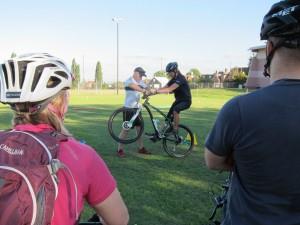 Boo Tarling and Brian Philpotts demonstrate a wheelie.