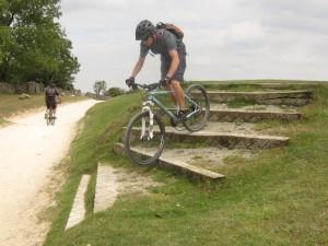 Riding down steps on Cleeve Hill common.
