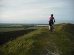 Mountain bike rider at Barbury Castle near Swindon.
