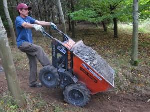 Ben dumping his load at trail build day.