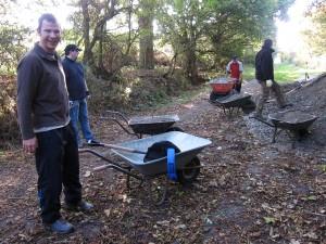 Shifting gravel at a trail build day.