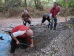 Moving limestone chippings at mountain bike trail.