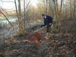 Raking out red gravel at the Croft Trail in Swindon.