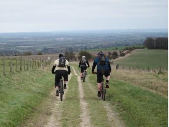 Mountain bikers on the ridgeway in Wiltshire.