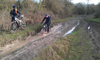 Riding through a puddle near Coate Water.
