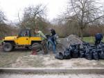 Shifting Limestone chippings for a mountain bike trail.