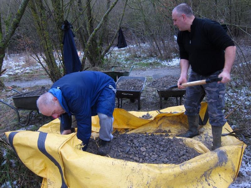 Large sack of gravel at trail build day.