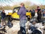 Loading Land Rover with gravel.