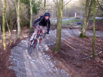 Test riding new berm at Wilsthire mountain bike trail.