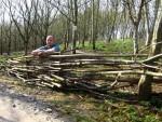 Wicker fence at mountain bike trail.