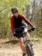 Woman mountain biker in the Forest of Dean.