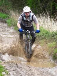 Rider going through a puddle on the Prospect Big Ride 2012