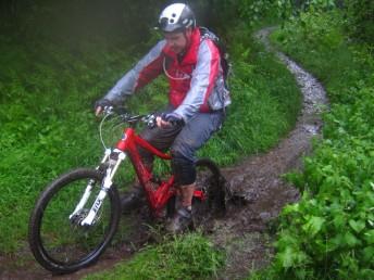 Wet mountain biker.