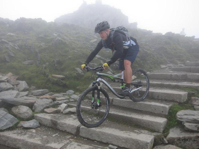 Riding down steps on Snowdon