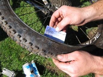 Fixing a tyre with a hole in it.