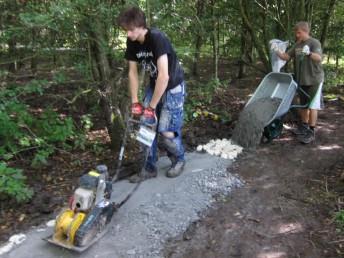 Fixing a mountain bike trail.