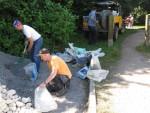 Loading chippings at mountain bike trail build day.