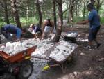 Armouring a mountain bike trail with rocks.