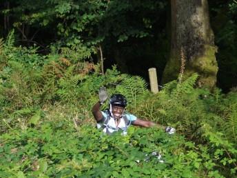 Having a little lie down in the bushes on a mountain bike ride.