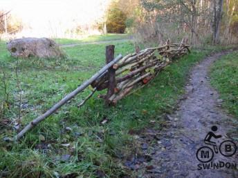 Anti bike fence at a mountain bike trail.