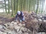 Laying rocks for a mountain bike trail.