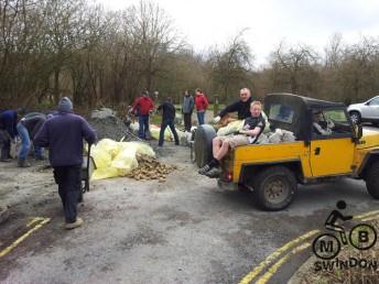 Land Rover shifting gravel.