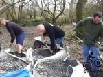 Shifting material at a trail build day.