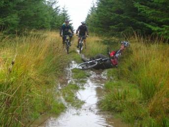 Mountain biker having a lie down.